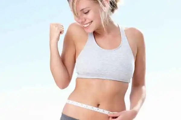 woman happy after fat reduction treatment Wiltshire